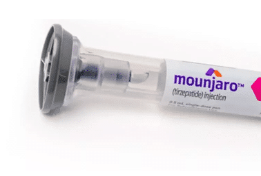 Close-up of a Mounjaro (tirzepatide) injection pen, labeled with its name and dosage information.