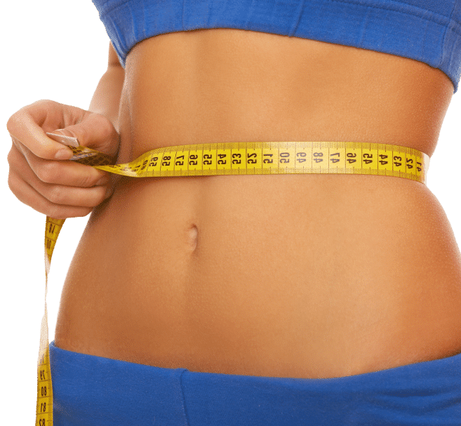 A woman measuring her waist with a tape measure, focusing intently on the measurement for fitness or health purposes.