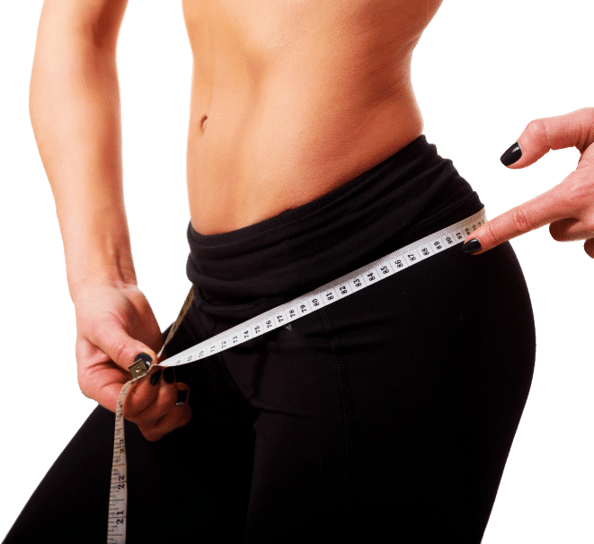 A woman measuring her waist with a tape measure, focusing intently on the measurement for fitness or health tracking.