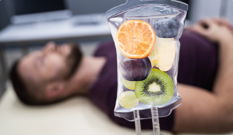 Man Having IV Drip - Harmonia Health Solutions