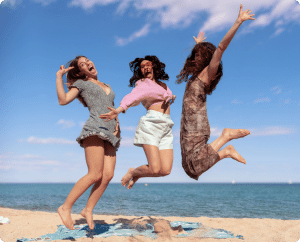 three woman laughing and bonding
