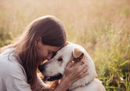 woman with her pet dog