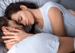 man and woman hugging