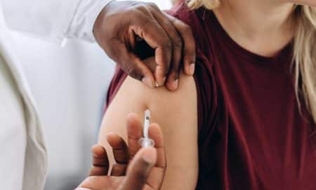 athlete woman getting b12 injections