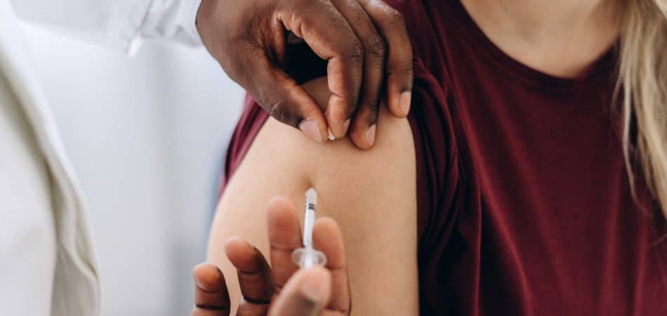 athlete woman getting b12 injections