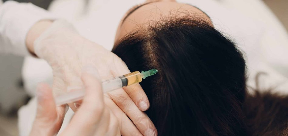 Needle mesotherapy. Cosmetic been injected in woman