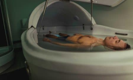 man resting in floating therapy
