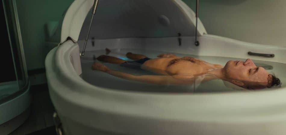 man resting in floating therapy