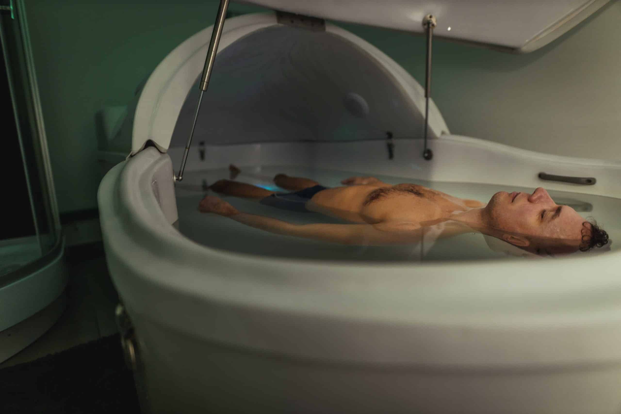 man resting in floating therapy